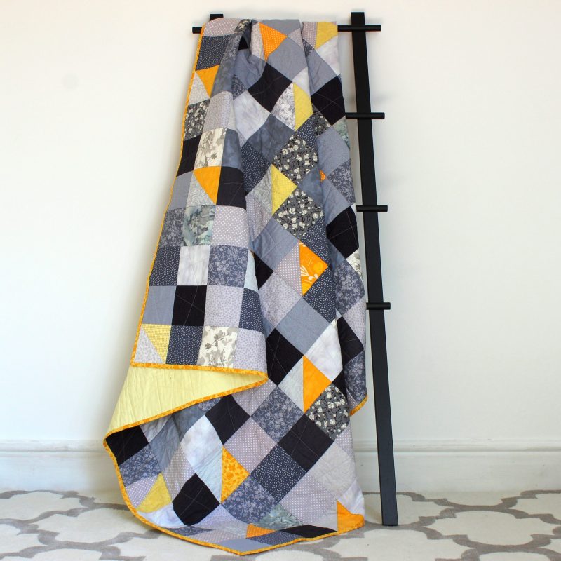 Grey and yellow quilt