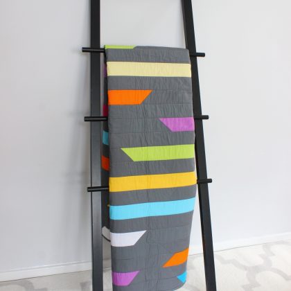 Grey and colour streaks quilt