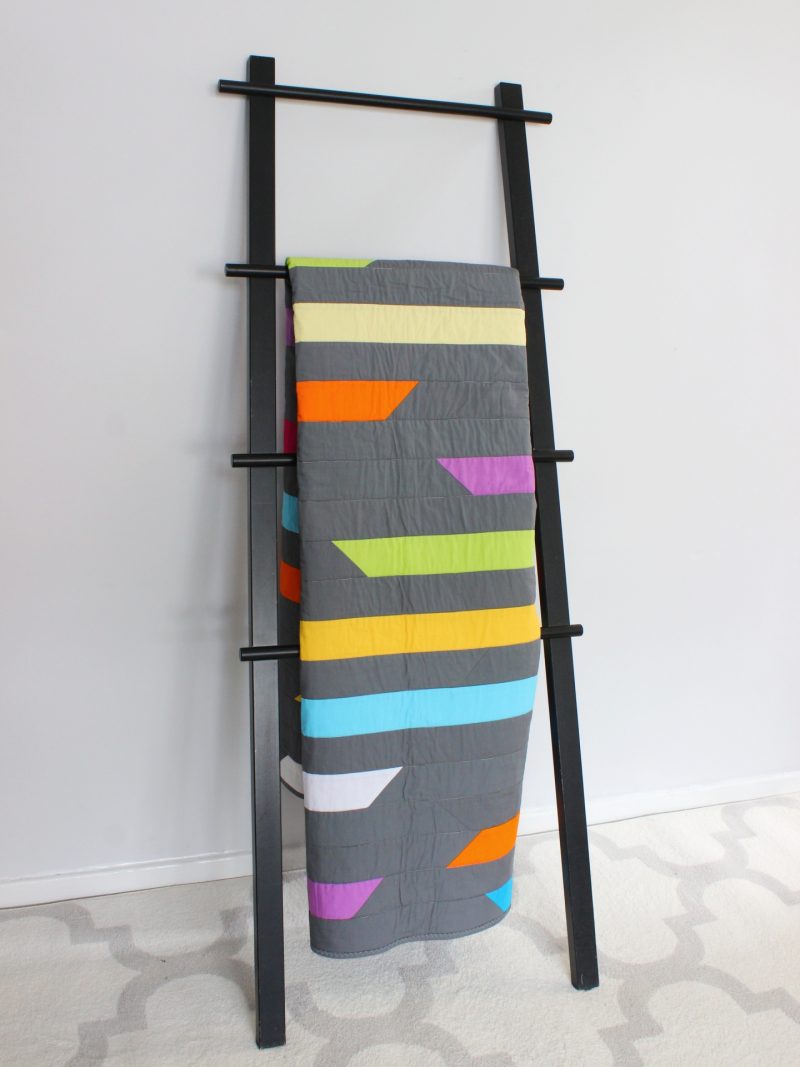 Grey and colour streaks quilt